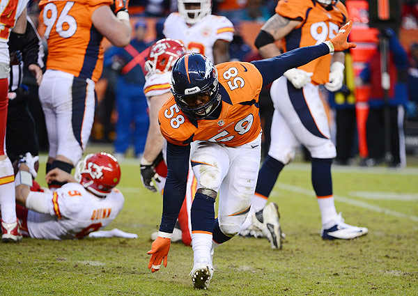 Von Miller (center) and the Broncos rank fourth in the league against the run this season.